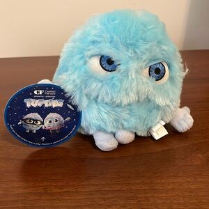 Small blue fluffy stuffed animal toy